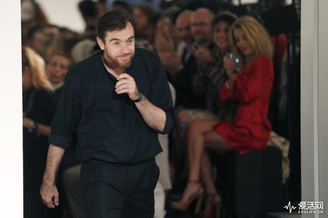 French designer Christophe Lemaire appears at the end of his Spring/Summer 2013 women's ready-to-wear fashion show for fashion house Hermes during Paris fashion week September 30, 2012. REUTERS/Charles Platiau
